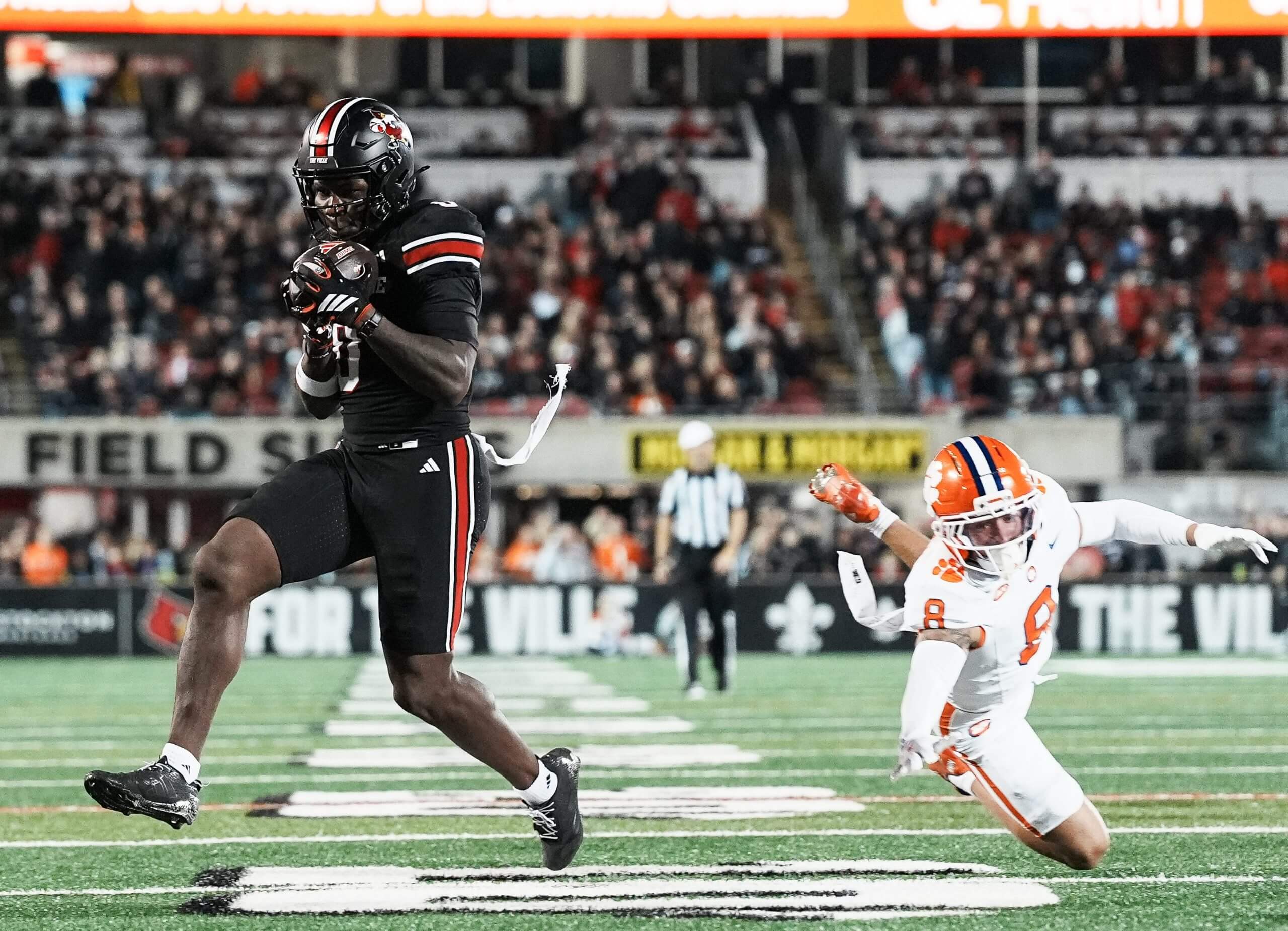 Louisville Cardinals wide receiver Chris Bell (0) got close to the end zone but officials ruled against his touchdown after a replay review as the Cards take on Clemson in the first half at L&N Stadium on Friday, Nov. 14, 2025.