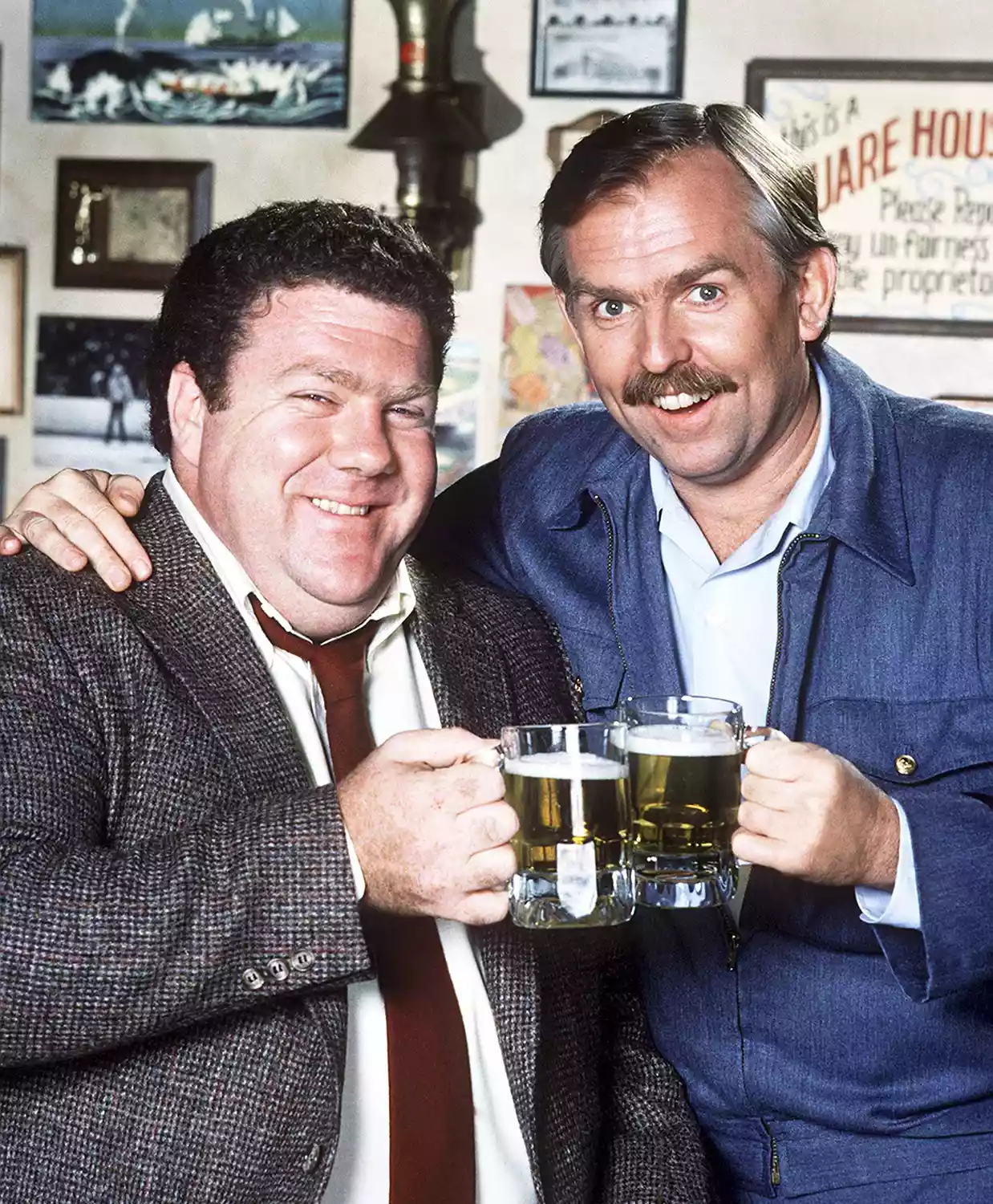 George Wendt as Norm Peterson, John Ratzenberger as Cliff Clavin on Cheers George Wendt as Norm Peterson, John Ratzenberger as Cliff Clavin on Cheers